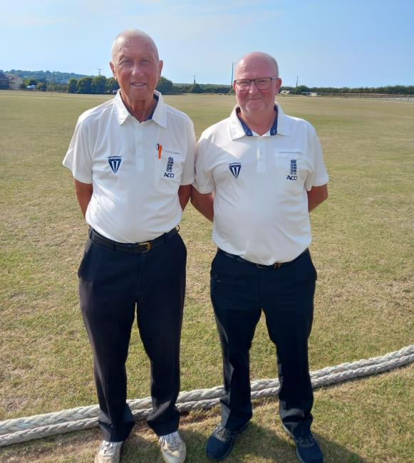Umpires Allan Hansen and Ian Milsom Umpires Allan Hansen and Ian Milsom